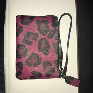 Coach wristlet. Like new. Pink/black. No scratches